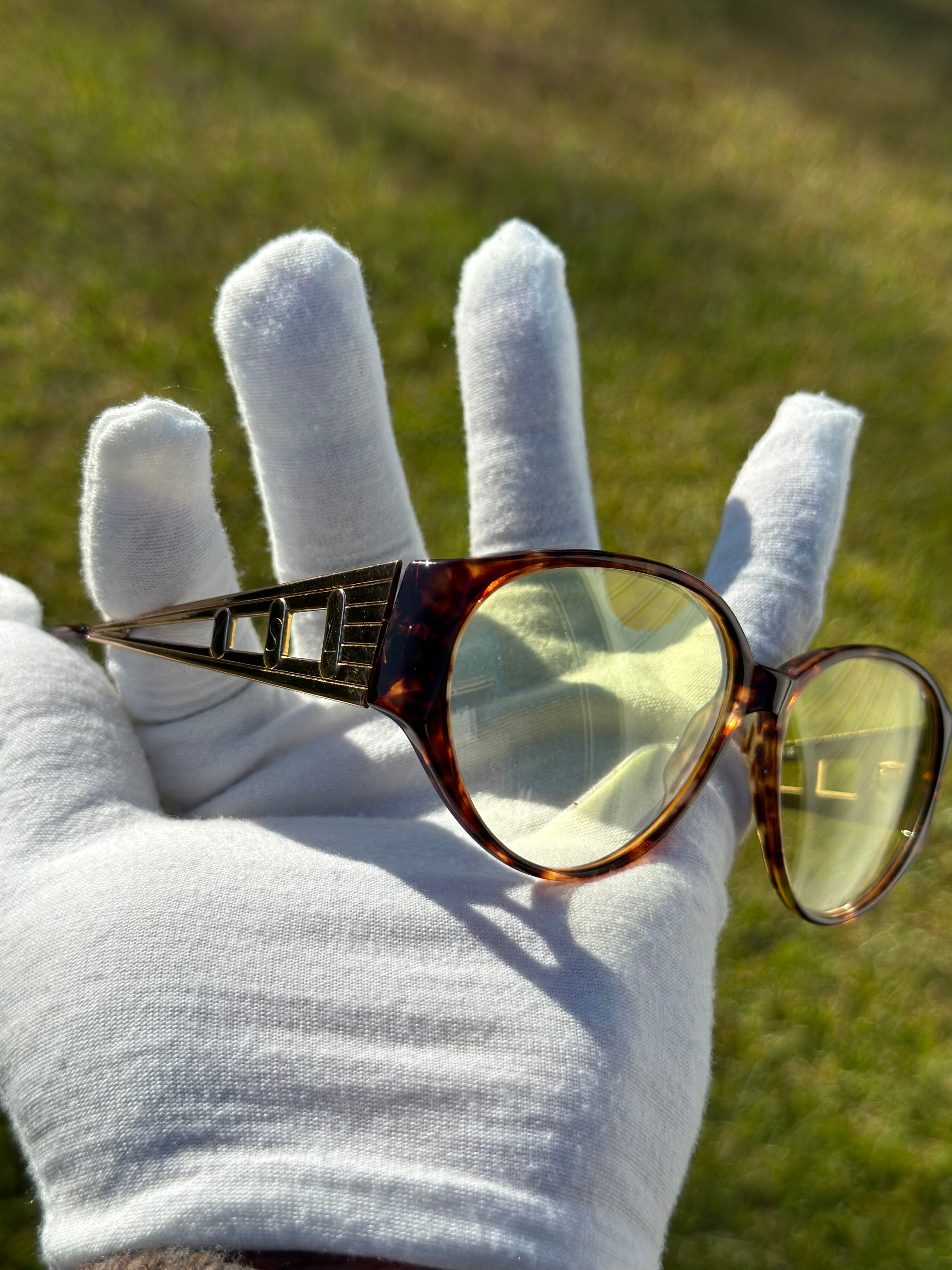 Yves Saint Laurent (custom yellow lenses)